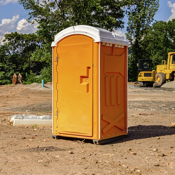 how often are the portable toilets cleaned and serviced during a rental period in South Amana